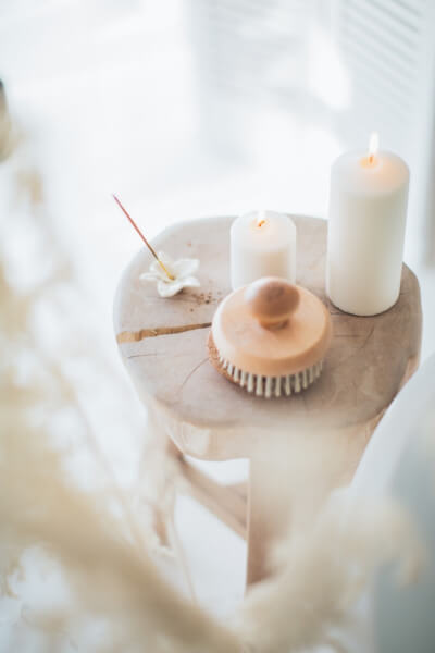 Candle, brush and incense stick